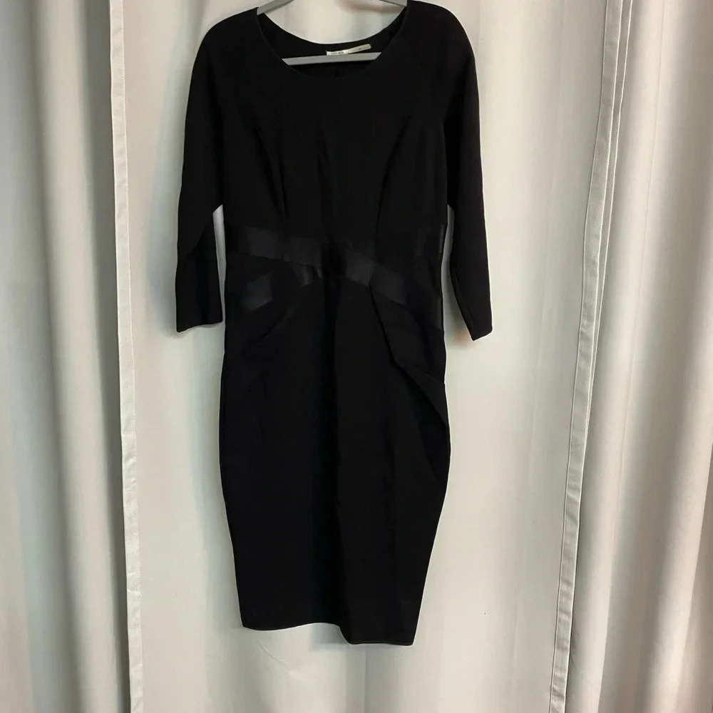 Leon Max limited edition black dress with leather criss cross at waist.  Size 12